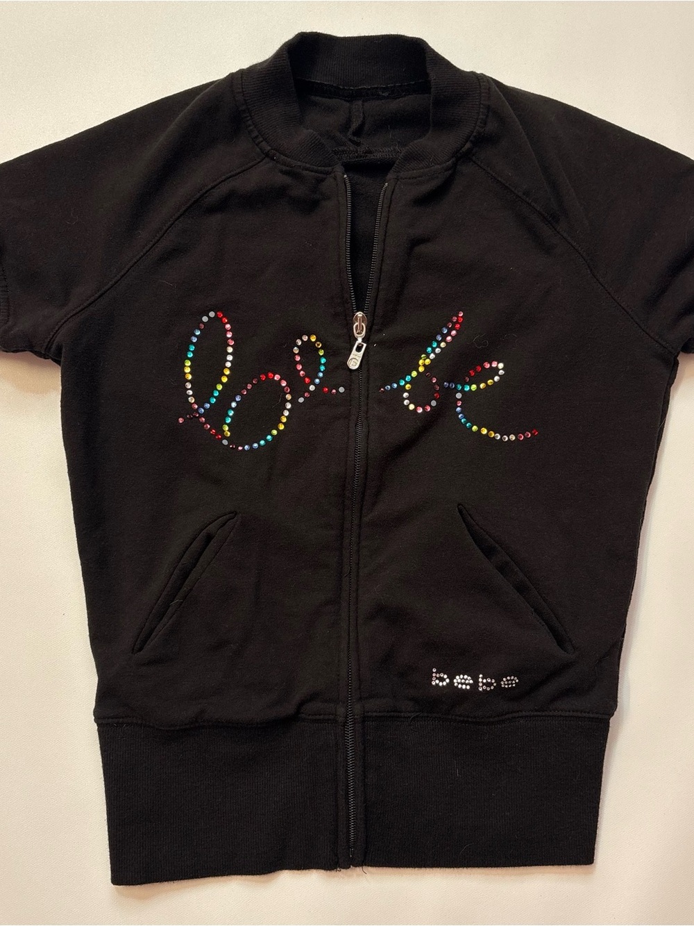 bebe Zip-Up Top with rhinestones